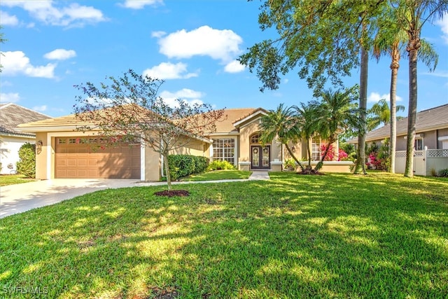 view of front of house featuring a front lawn and a garage