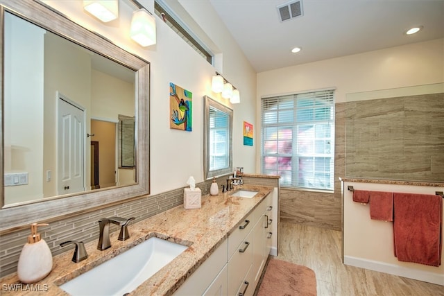 bathroom with wood-type flooring and vanity