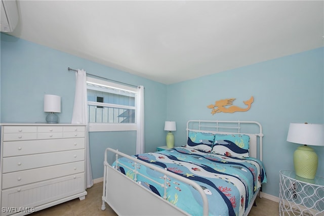 bedroom with a wall unit AC