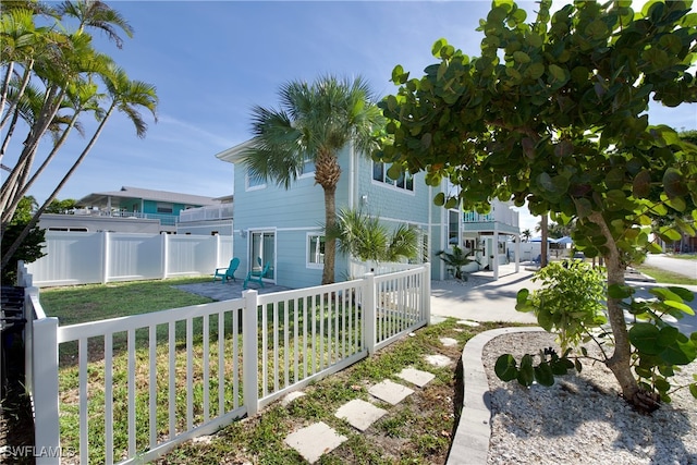 exterior space with a front lawn