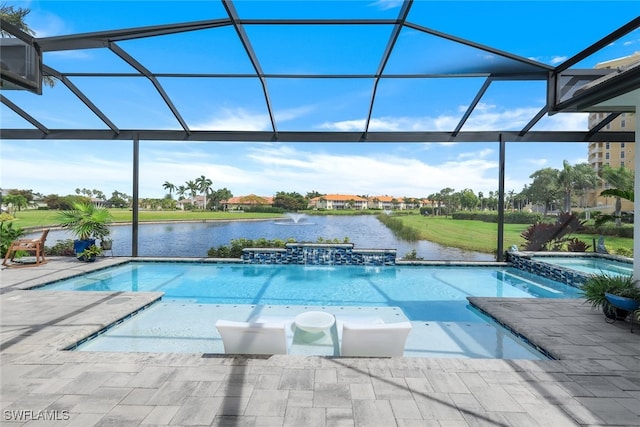 view of swimming pool with a patio, a water view, a lanai, and a pool with connected hot tub