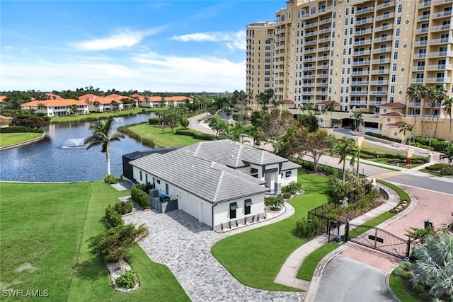 birds eye view of property with a water view