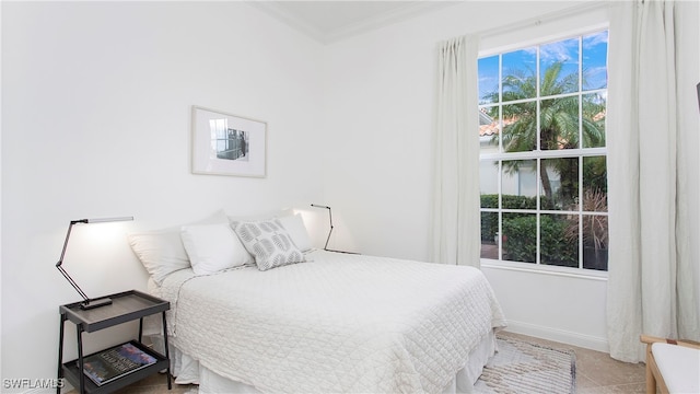 bedroom with ornamental molding