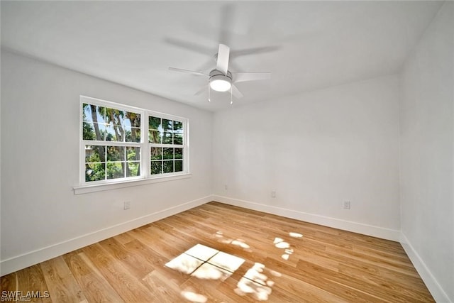 unfurnished room with light hardwood / wood-style flooring and ceiling fan