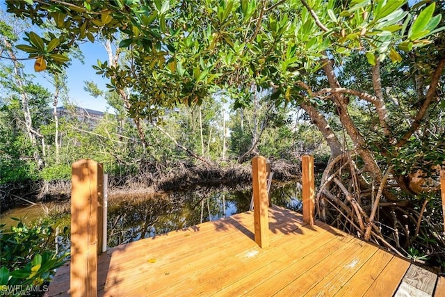 deck featuring a water view