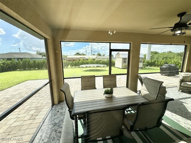 view of patio featuring ceiling fan