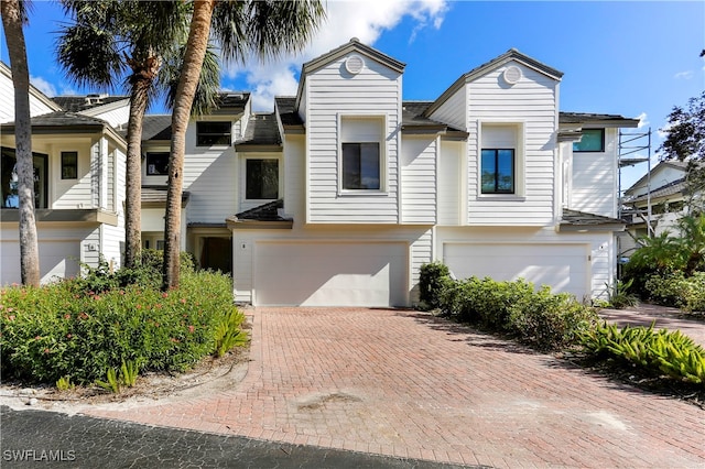 view of property featuring a garage