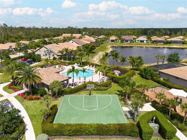 birds eye view of property with a water view