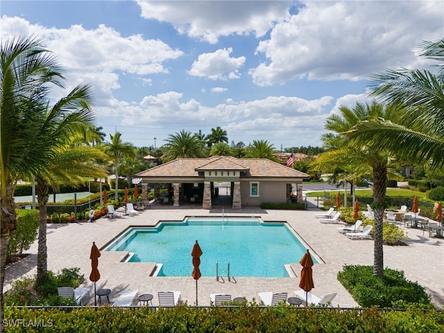 view of swimming pool featuring a patio