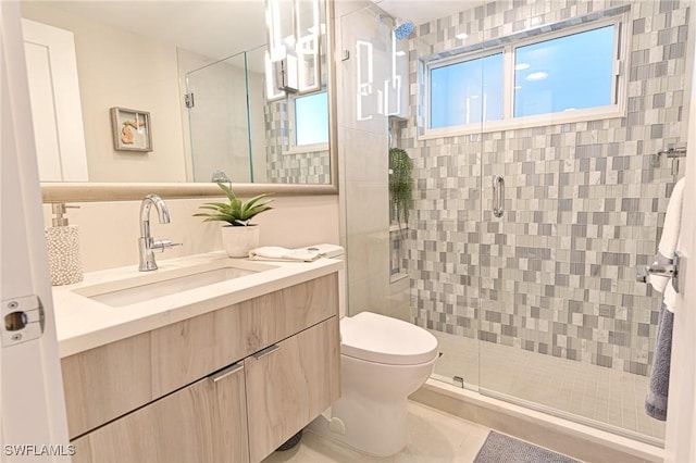 25875 Hickory Blvd Unit 502, Bonita Springs, FL 34134 - full bathroom with vanity, a shower stall, and tile patterned floors