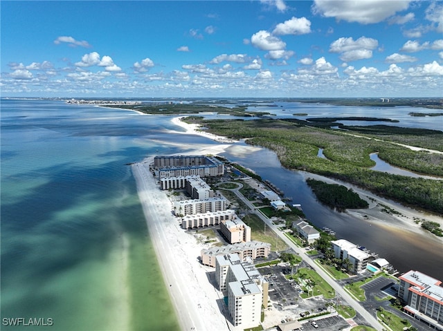 bird's eye view with a view of the beach and a water view