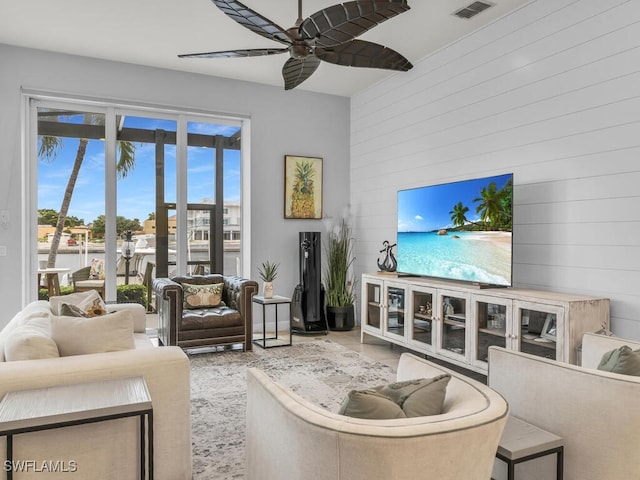 living room featuring ceiling fan