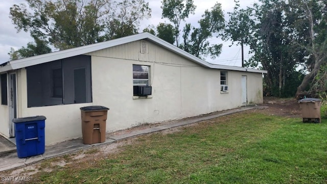 view of property exterior featuring a yard