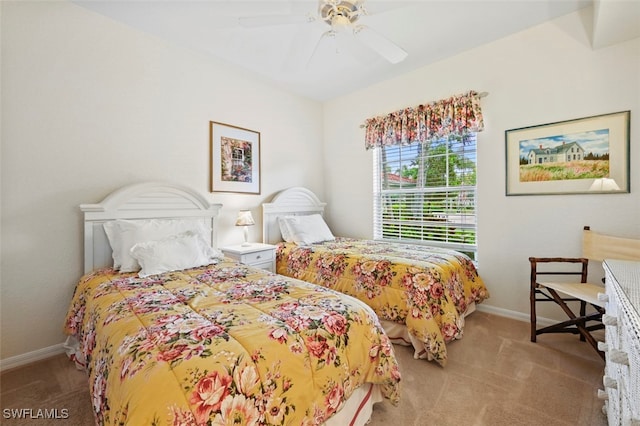 bedroom featuring ceiling fan and carpet flooring