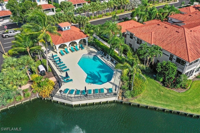 birds eye view of property featuring a water view