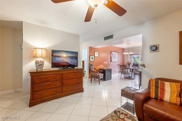 living room with light tile patterned floors and ceiling fan