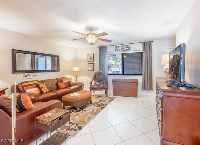 living room with light tile patterned floors and ceiling fan