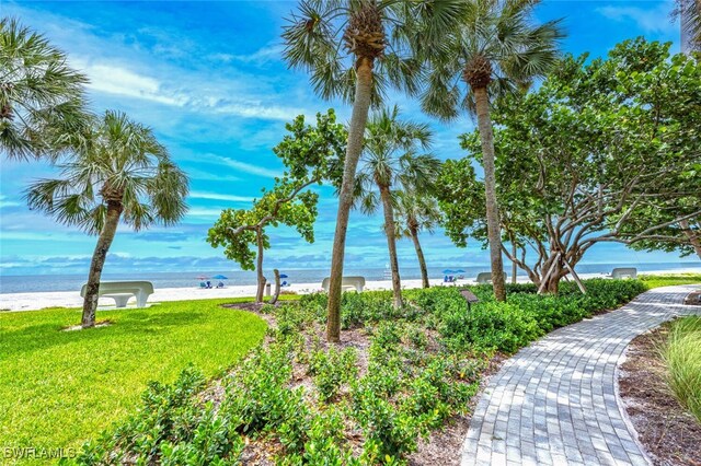 property view of water featuring a beach view