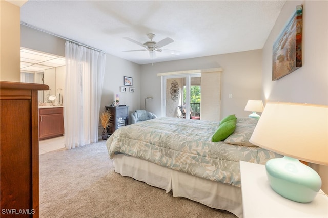 carpeted bedroom featuring ensuite bath, ceiling fan, and access to exterior