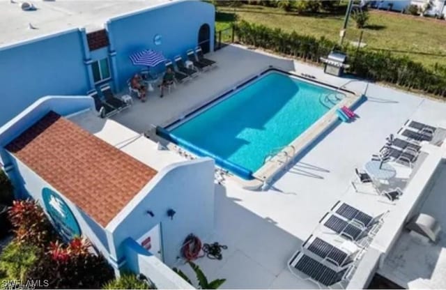 pool with a patio