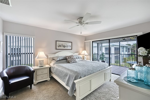 bedroom featuring light carpet, access to exterior, and ceiling fan