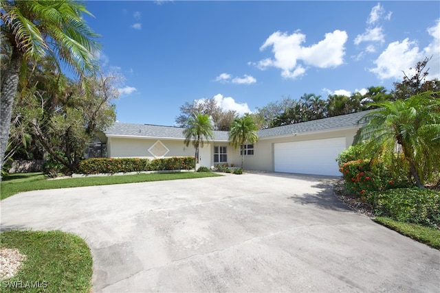 single story home with a garage