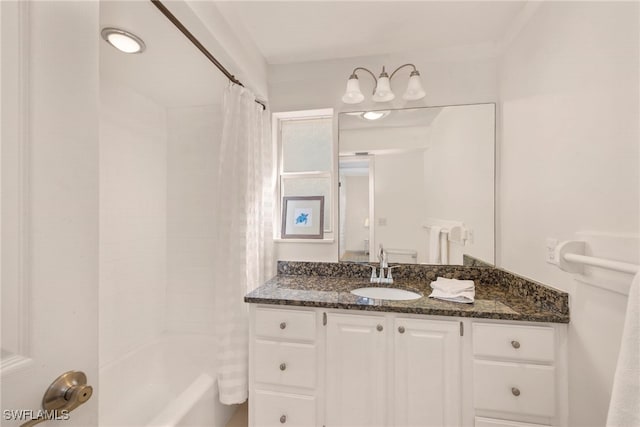 bathroom with vanity and shower / bath combo