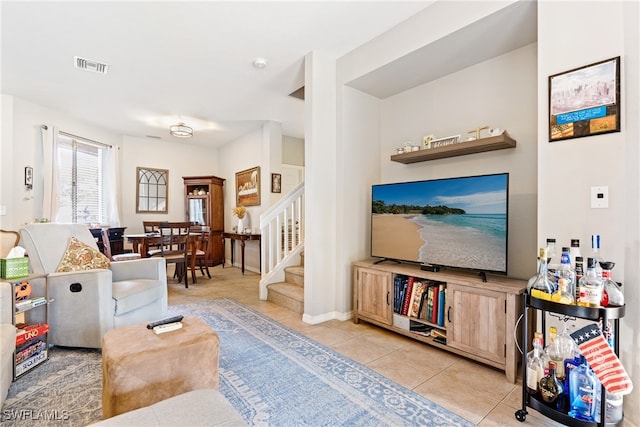 living room featuring light tile patterned floors