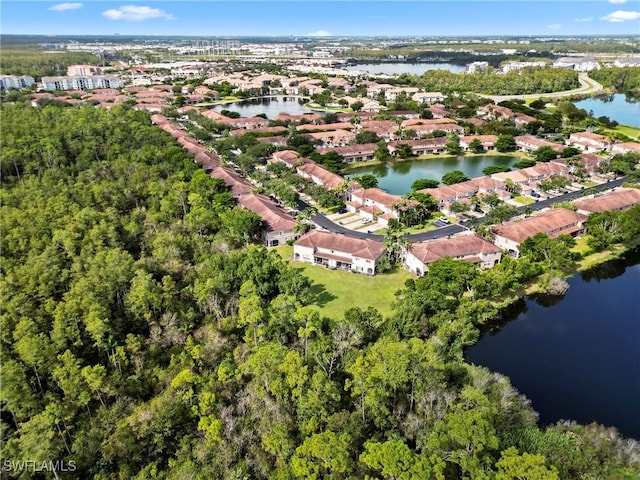 drone / aerial view with a water view