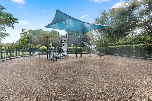 communal playground featuring fence
