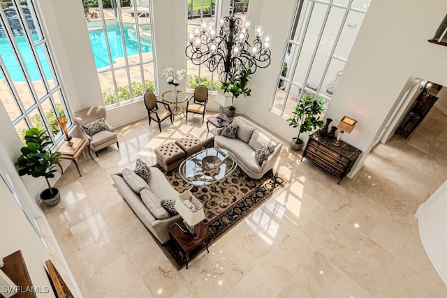 living room with an inviting chandelier