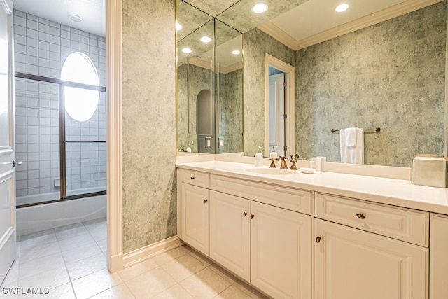 bathroom with shower / bath combination with glass door, crown molding, tile patterned flooring, and vanity