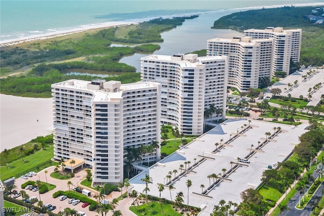 aerial view featuring a beach view and a water view