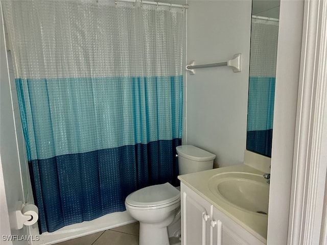 full bathroom with shower / bath combination with curtain, tile patterned floors, vanity, and toilet