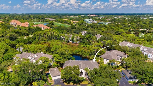 27026 Oakwood Lake Dr Unit 202, Bonita Springs, FL 34134 - drone / aerial view featuring a residential view and a water view