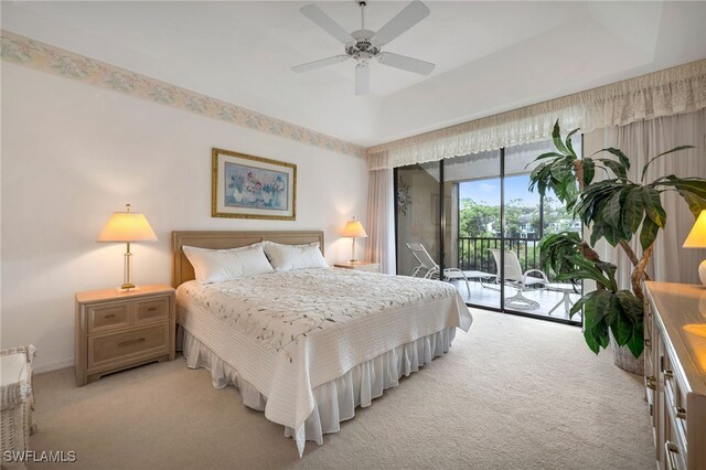 carpeted bedroom with access to outside and ceiling fan