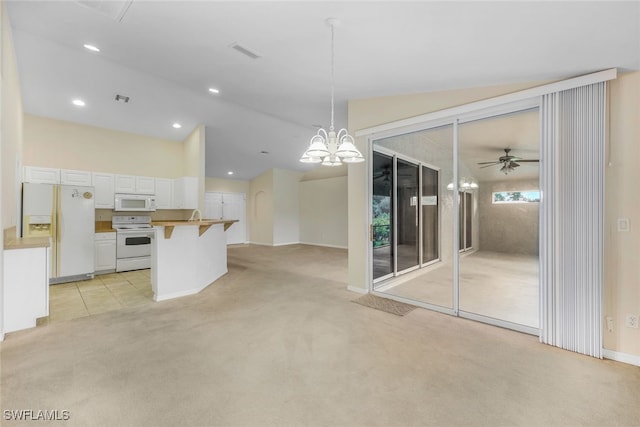 interior space featuring ceiling fan with notable chandelier and light carpet