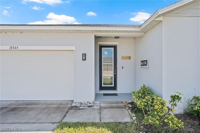 entrance to property with a garage