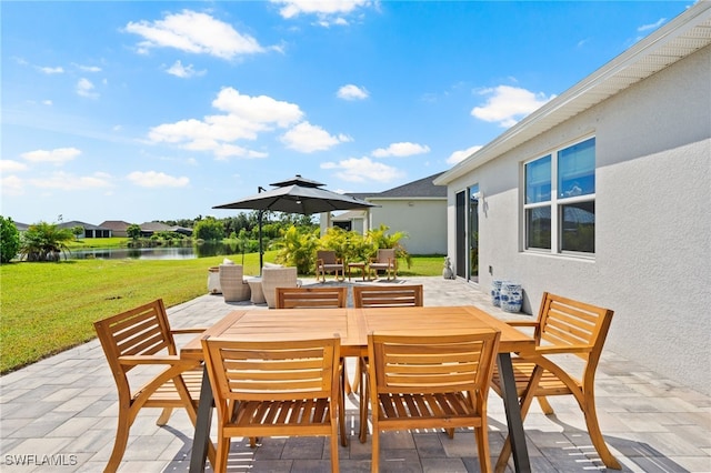 view of patio / terrace with a water view