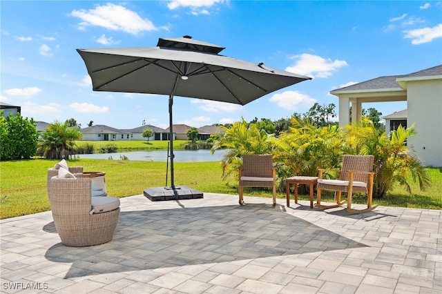 view of patio / terrace featuring a water view