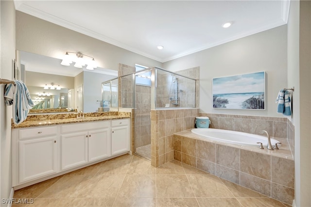 bathroom featuring vanity, shower with separate bathtub, crown molding, and tile patterned flooring