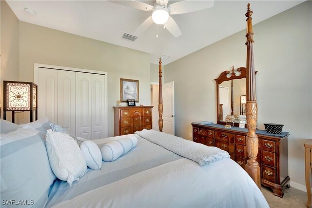 bedroom with ceiling fan and a closet