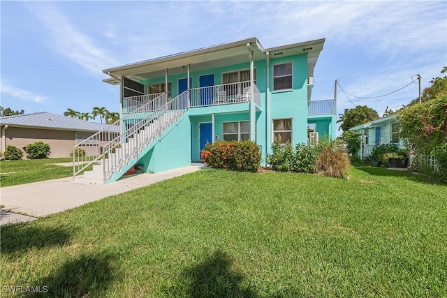 view of front of house with a front lawn