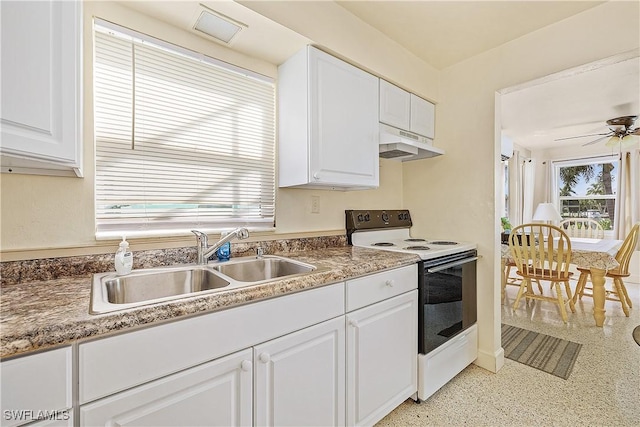 kitchen featuring white cabinets, electric range, ceiling fan, and sink