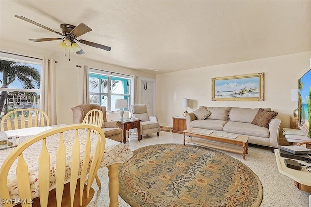 living room featuring ceiling fan