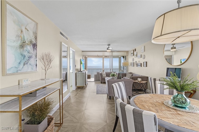 dining area featuring ceiling fan