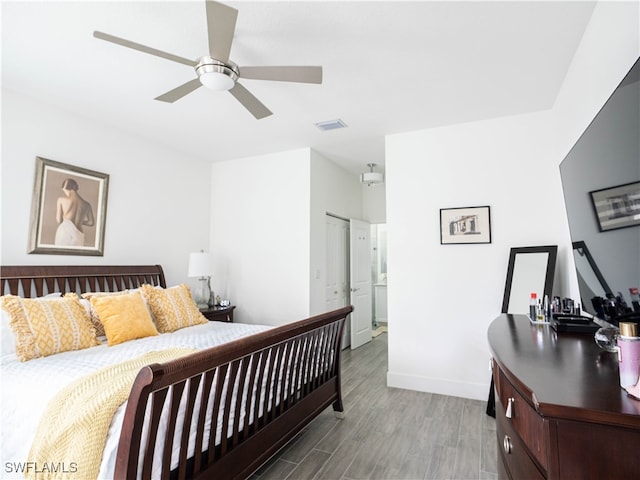 bedroom featuring ceiling fan and hardwood / wood-style floors