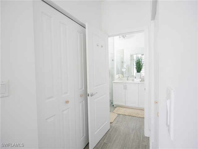 hallway featuring sink