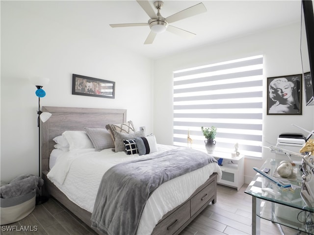 bedroom featuring light hardwood / wood-style flooring and ceiling fan