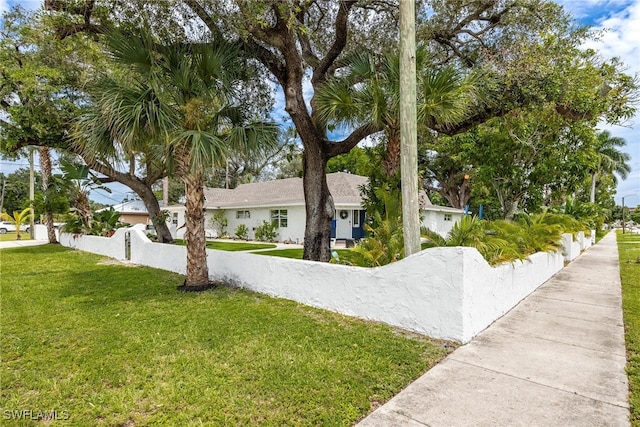 view of front of home with a front yard